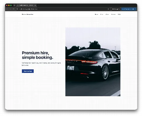 The Studio theme: a white page with a blue accent, a vehicle photograph beside the headline, and a plain booking call to action.